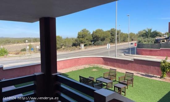 Estupendo apartamento en planta baja con jardin y piscina comunitaria - ALICANTE