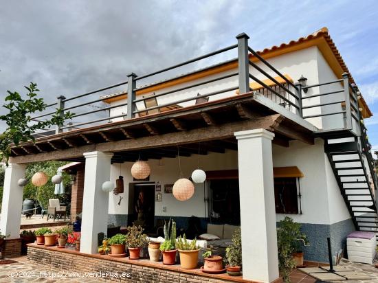  Se vende encantadora casa unifamiliar con un extenso terreno de 2.350 m² - MALAGA 