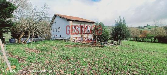 CASA PAREADA DE ESTILO MONTAÑES, CON AMPLIA PARCELA. BERANGA - CANTABRIA