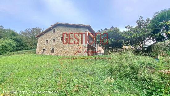 CASA PAREADA DE ESTILO MONTAÑES CON TERRENO. LIMPIAS - CANTABRIA