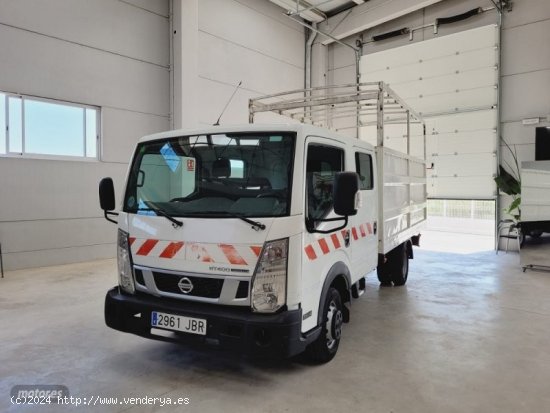 Nissan Cabstar caja abierta con toldo,140cv de 2014 con 168.455 Km por 1 EUR. en Valencia