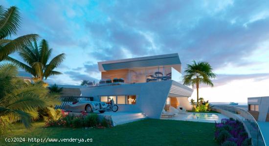  casa de cuatro  dormitorios con jardín 218m2 y espectaculares vistas al mar - MALAGA 