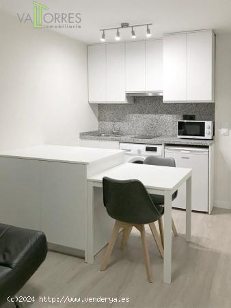 Apartamento amueblado en calle principal del centro de Teruel con garaje. - TERUEL