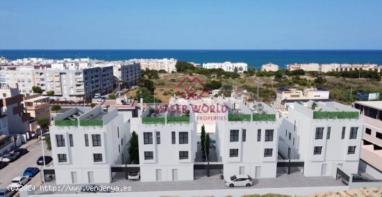 CHALETS ADOSADOS DE OBRA NUEVA EN GUARDAMAR DEL SEGURA - ALICANTE