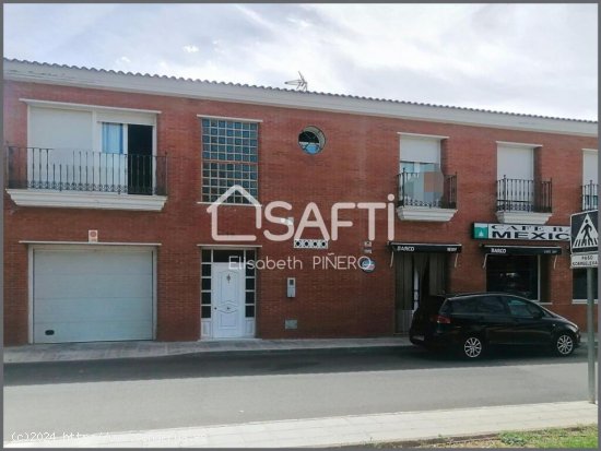 Vivienda más local comercial con garaje y solar