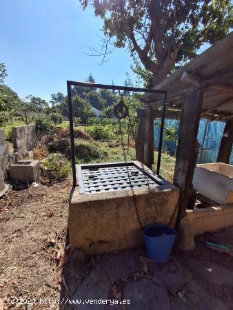  CASA CON TERRENO EN EL CENTRO DE CAMPONARAYA CON POZO - LEON 