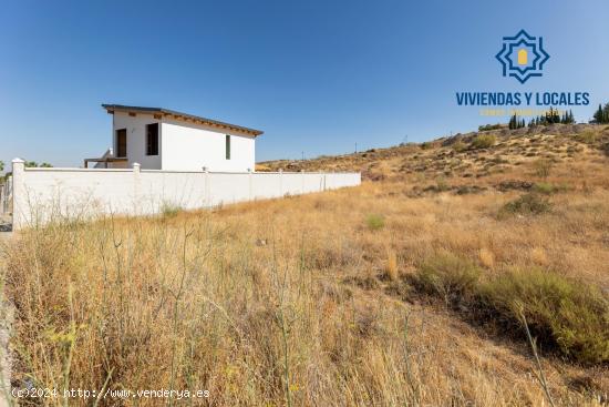  SE VENDE UN SOLAR EN URB.CAÑADAS DEL PARQUE, DILAR - GRANADA 