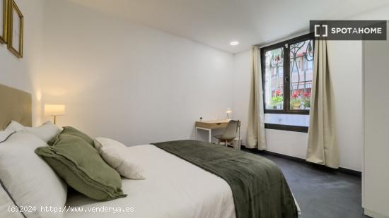 Dormitorio en un apartamento de 7 habitaciones en Barcelona - BARCELONA