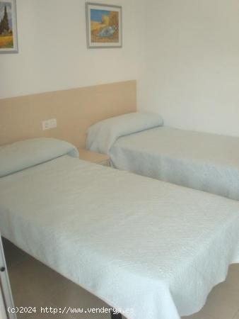 APARTAMENTO DE 2 DORMITORIOS CON A.A., VISTA A LAS PISCINAS. ED. PARADISE VILLAGE B. - TARRAGONA