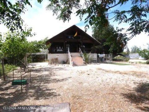 Encantadora Casa de Madera con Parcela en el Paraje de Molina de Segura - Tranquilidad y Confort a P