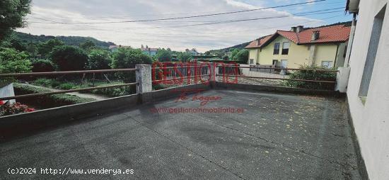 CASA ADOSADA CON TERRENO  EN ARNUERO. - CANTABRIA