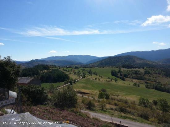 Parcela junto al pueblo de 268m en Laspaúles, pirineo aragonés. Ideal para vivienda unifamiliar. -