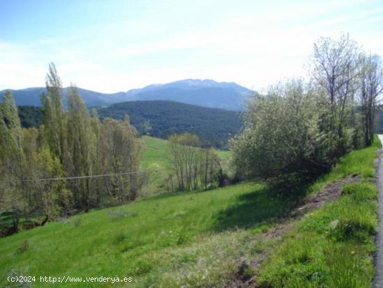 Parcela junto al pueblo de 268m en Laspaúles, pirineo aragonés. Ideal para vivienda unifamiliar. -