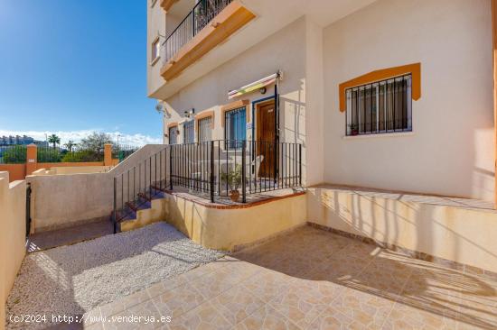 APARTAMENTO PLANTA BAJA EN PLAYA FLAMENCA CON DOS DORMITORIOS Y DOS BAÑOS - ALICANTE