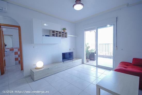 ATICO CON GRAN TERRAZA Y SOLARIUM DE 2 DORMITORIOS EN PLAYA FLAMENCA EN (ORIHUELA COSTA) - ALICANTE