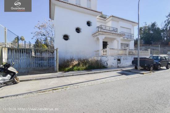  EDIFICACION Y PARCELA PARA USOS MULTIPLES. - GRANADA 