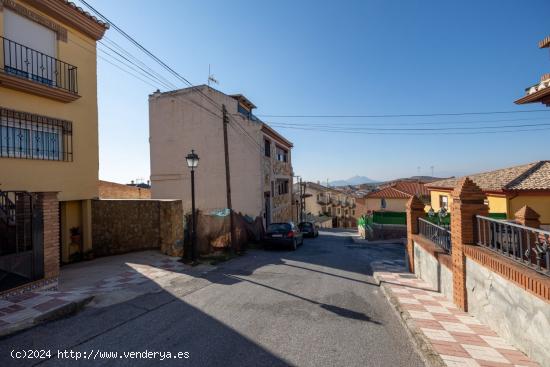 Solar orientado a dos calles en muy buena zona - GRANADA