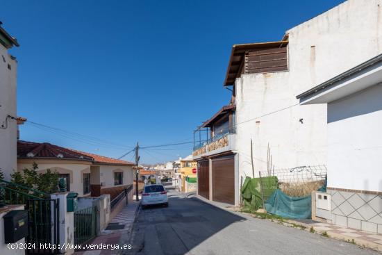 Solar orientado a dos calles en muy buena zona - GRANADA