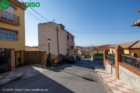 Solar orientado a dos calles en muy buena zona - GRANADA