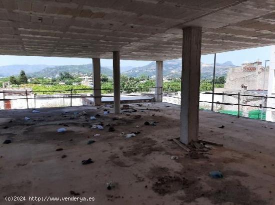 Edificio de 12 pisos en construcción paralizada en Beniarjó - VALENCIA