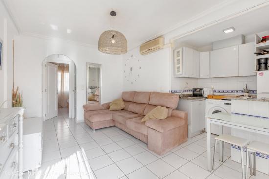 Gran Apartamento en Planta Baja con Porche , Jardín y Piscina Comunitaria en torreblanca - ALICANTE