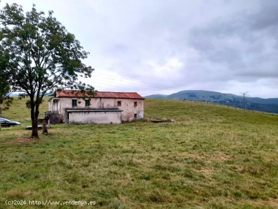 Casa de piedra con terreno para reformar en Riotuerto - CANTABRIA