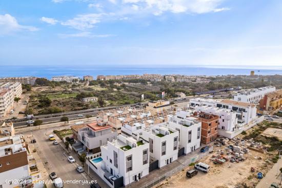 CHALETS ADOSADOS DE OBRA NUEVA EN GUARDAMAR DEL SEGURA - ALICANTE