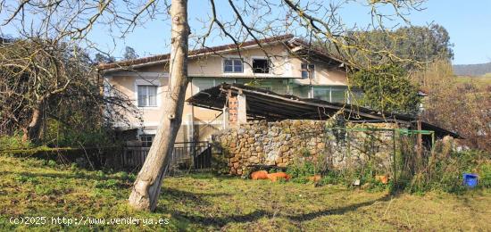 Casa y terreno urbano de 3.000 m2. - CANTABRIA