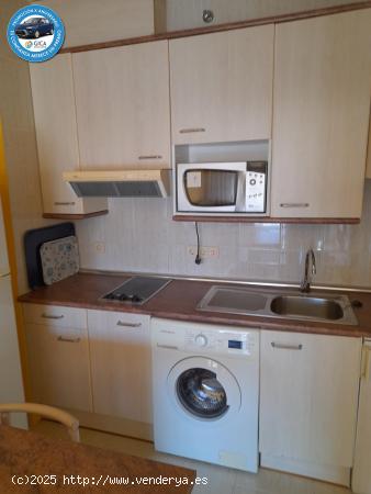 INVERSIÓN. APARTAMENTO Y PLAZA DE GARAJE APARTAHOTEL LAS DUNAS. - CADIZ