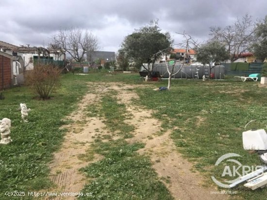 TERRENO OKUPADO DE 1.000 M2 EN EL VISO DE SAN JUAN