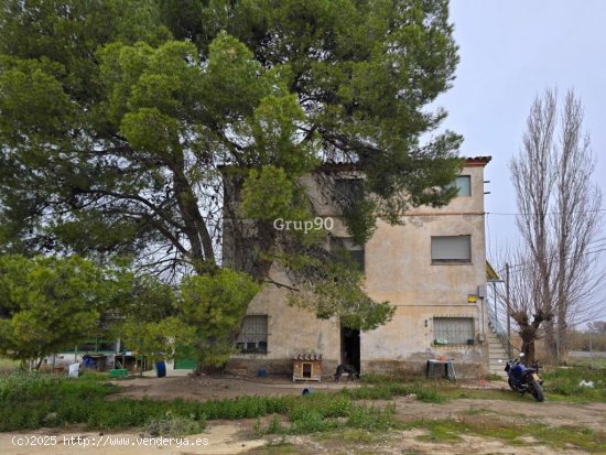 Oportunidad única: Casa con amplio terreno en Lleida