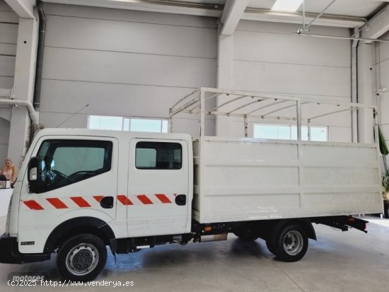 Nissan Cabstar caja abierta con toldo,140cv de 2014 con 168.455 Km por 1 EUR. en Valencia