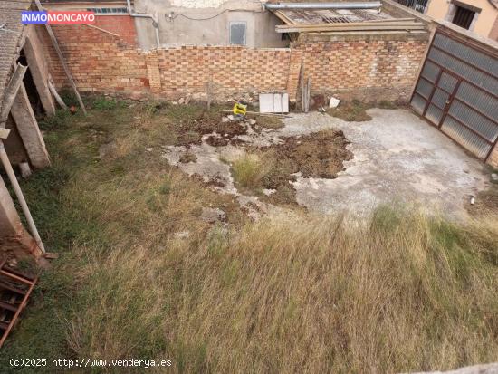 Se vende casa con solar anexo en el centro de Novallas - ZARAGOZA