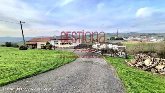 CASA INDEPENDIENTE CON AMPLIO TERRENO. CUDON - CANTABRIA