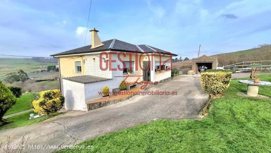 CASA INDEPENDIENTE CON AMPLIO TERRENO. CUDON - CANTABRIA