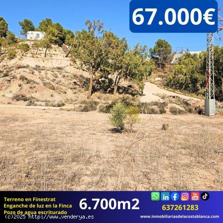 Terreno plano de 6,700 m2 con balsa y pozo propio escriturado en Finestrat 67,000€ - ALICANTE