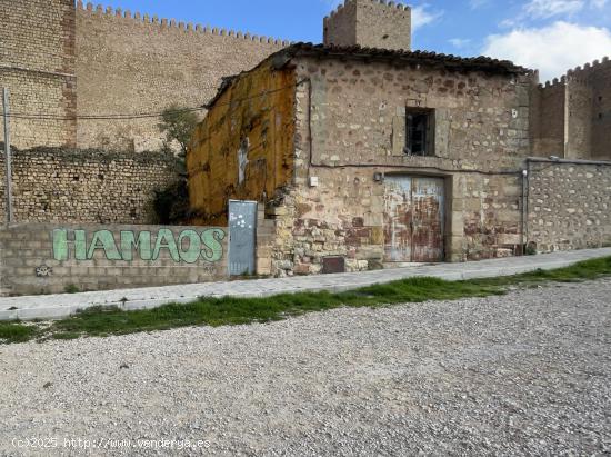 INMOBILIARIA ARBETETA VENDE CASA DE PUEBLO CON TERRENO URBANIZABLE EN SIGÜENZA - GUADALAJARA