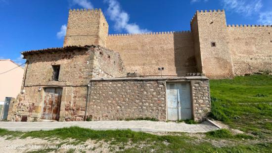 INMOBILIARIA ARBETETA VENDE CASA DE PUEBLO CON TERRENO URBANIZABLE EN SIGÜENZA - GUADALAJARA